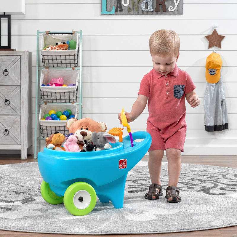 Springtime Wheelbarrow boy playing with indoors