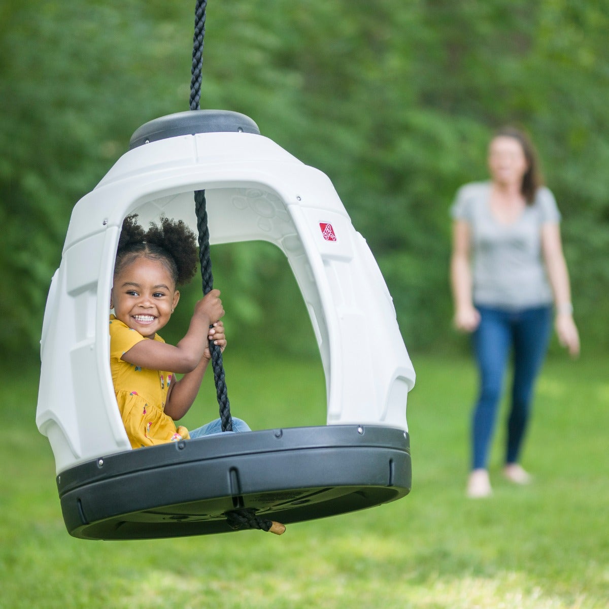 Space Capsule Swing girl swinging