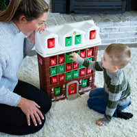 My First Advent Calendar with child pulling out a bin