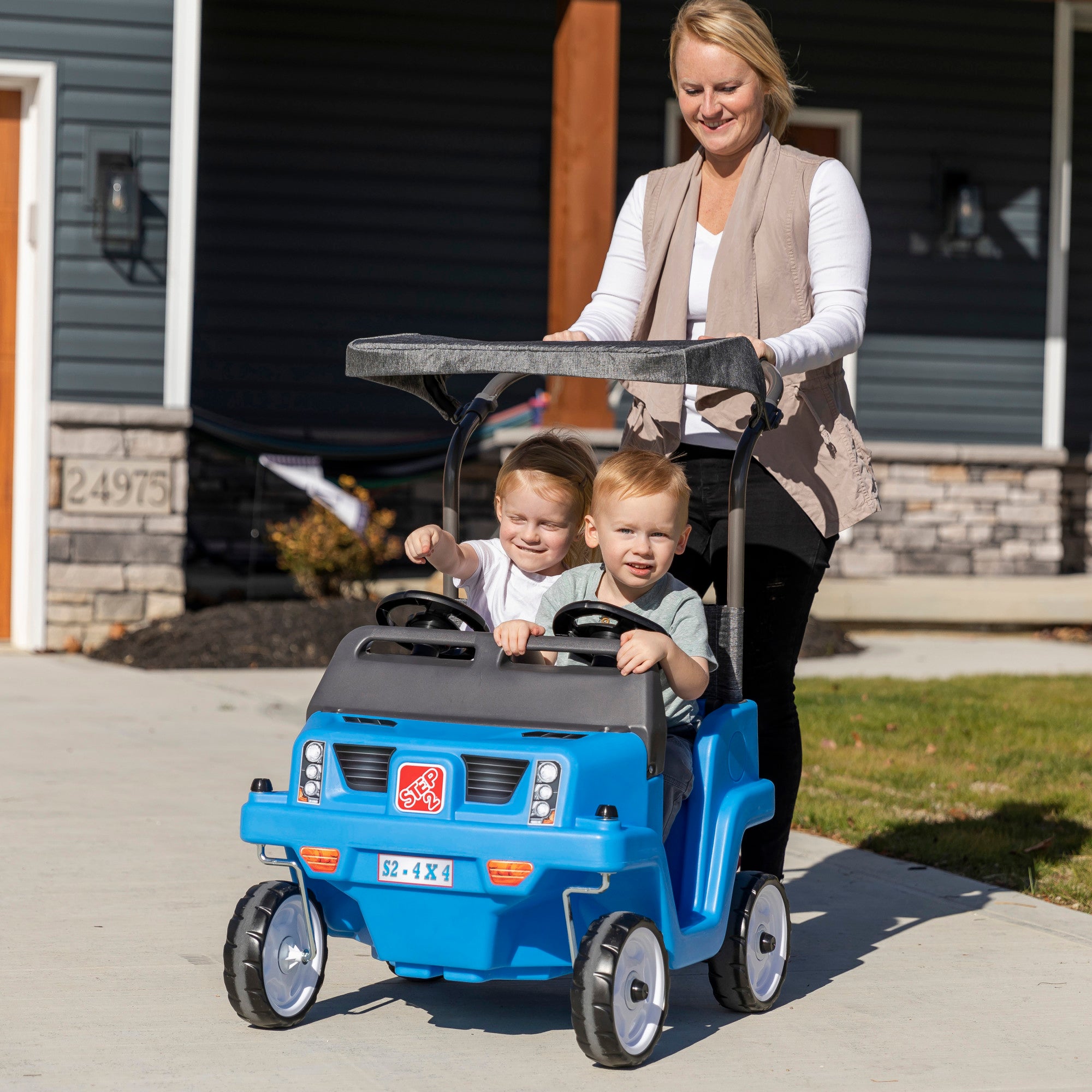 Side-By-Side Push Around SUV™ - Blue with children riding