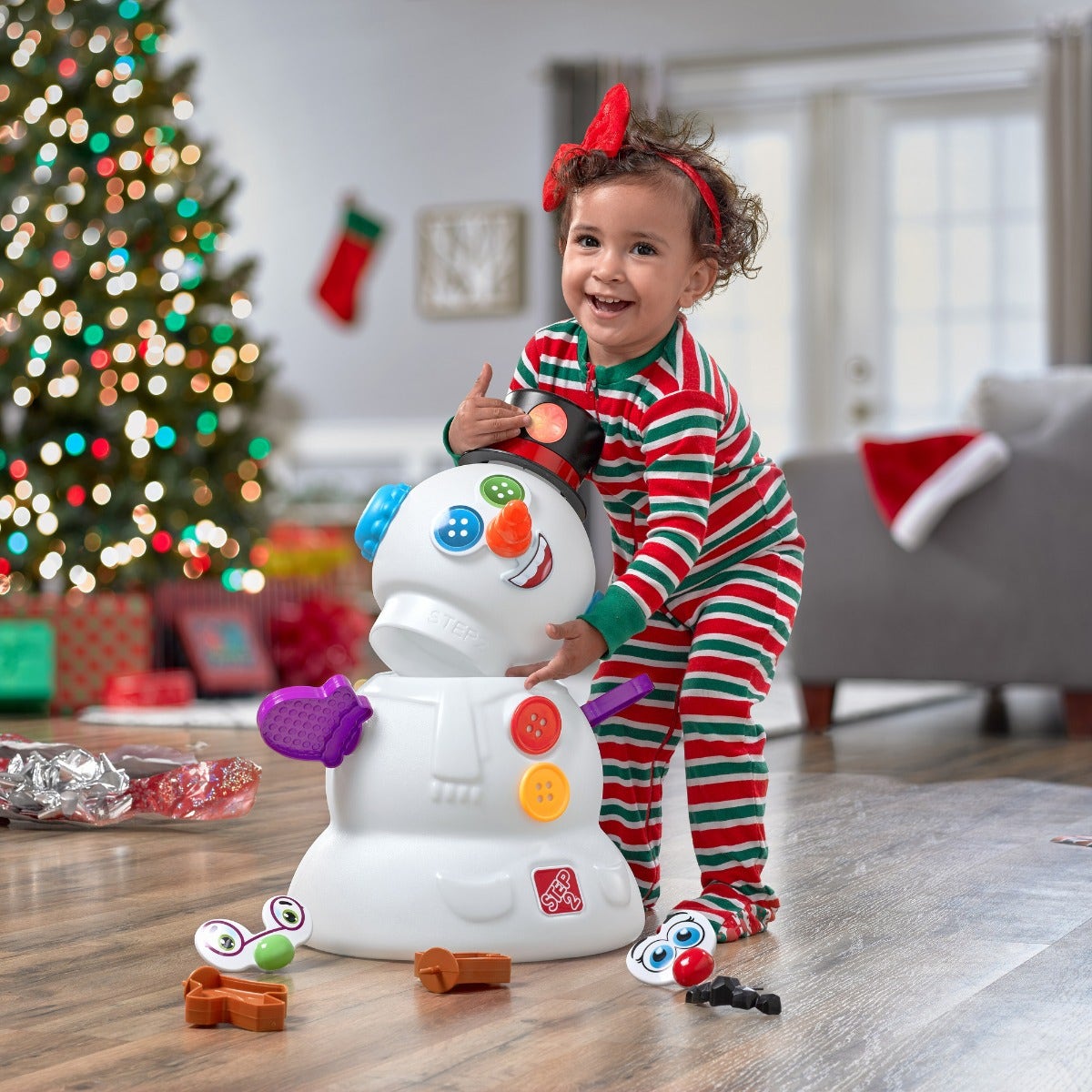 My First Snowman girl playing with snowman