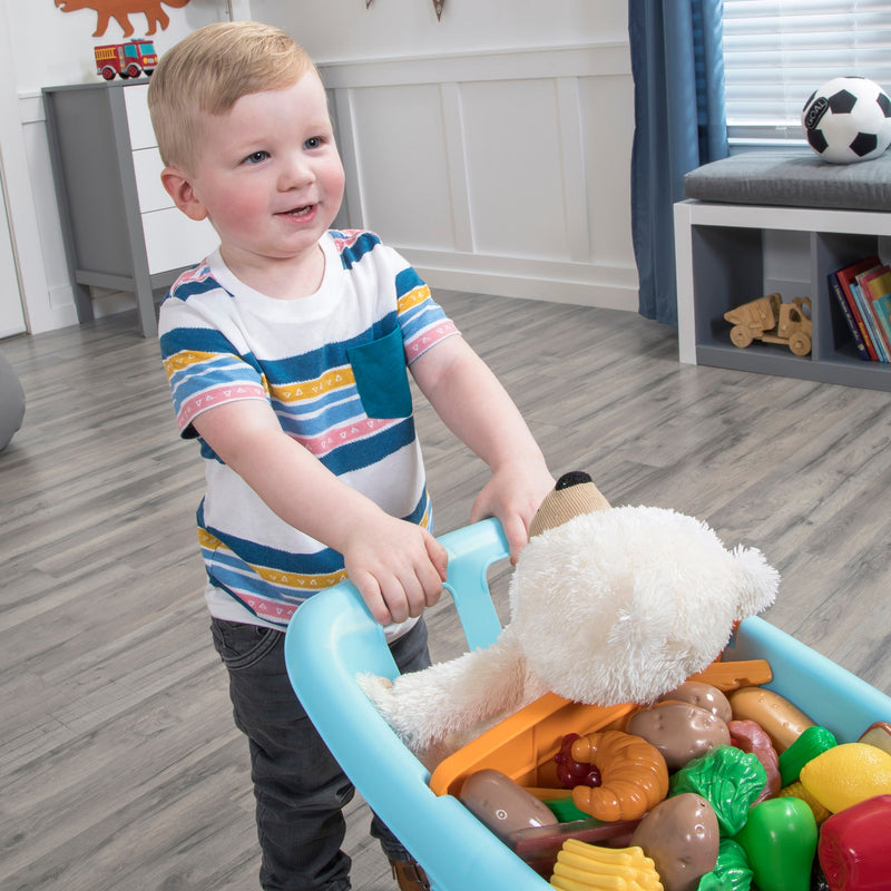 Little Helper’s Cart & Shopping Set™ - Light Blue boy pushing cart