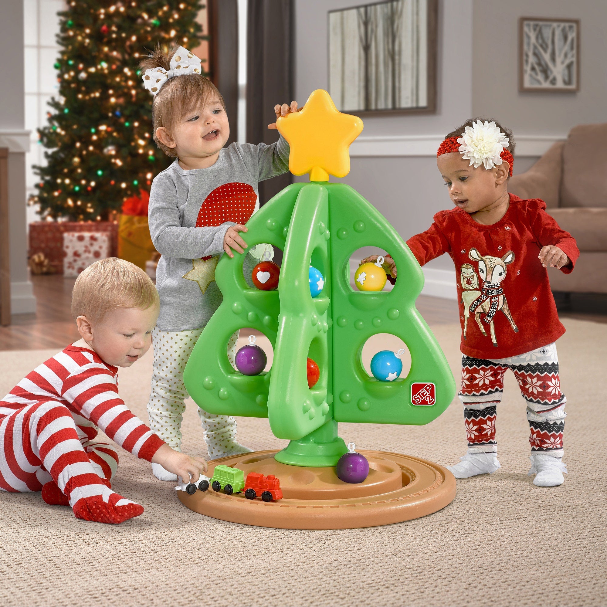 Kids playing with Christmas Tree toy